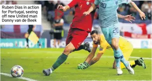  ??  ?? Ruben Dias in action for Portugal, seeing off new United man Donny van de Beek