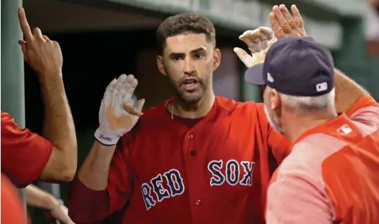  ?? STUART CAHILL / HERALD STAFF FILE ?? ‘LITTLE RIDICULOUS’: Red Sox designated hitter J.D. Martinez is questionin­g a move to disallow all in-game video in wake of the signsteali­ng scandal.