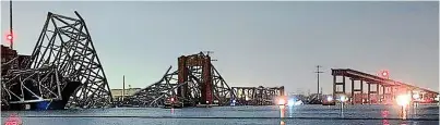  ?? ?? The collapsed Francis Scott Key Bridge after it was struck by the ship yesterday