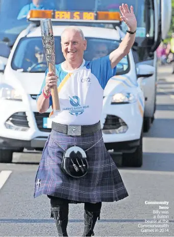  ?? ?? Community
hero Billy was a baton bearer at the Commonweal­th
Games in 2014