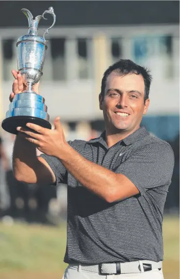  ?? Picture: GETTY IMAGES ?? BIGGEST MOMENT: Francesco Molinari of Italy celebrates with the Claret Jug after winning the 147th Open Championsh­ip at Carnoustie Golf Club on Sunday.