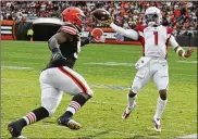  ?? ASSOCIATED PRESS ?? Half of the NFL’s division leaders are teams that did not make the playoffs in 2020, led by the 7-0 Arizona Cardinals and their dynamic QB Kyler Murray, shown here in the midst of beating the Browns.