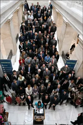  ?? (Arkansas Democrat-Gazette/Stephen Swofford) ?? People fill the steps outside the House Chamber at the state Capitol on Wednesday as Gov. Sarah Huckabee Sanders unveils her education program. “This is the most substantia­l overhaul of our state’s education system in Arkansas history, and frankly it couldn’t come soon enough,” she said.