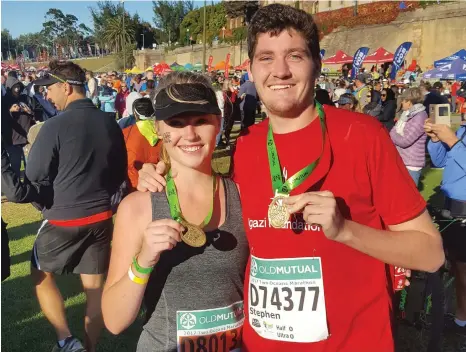  ?? Photo: Supplied ?? Rhodes students Samantha Hultum and Stephen Pettitt with their Half-marathon finishing medals.