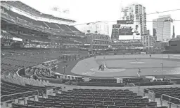  ?? ROB SCHUMACHER/THE REPUBLIC ?? Diamondbac­ks starting pitcher Madison Bumgarner throws to San Diego Padres Manny Machado in the first inning on opening day at Petco Park in San Diego.