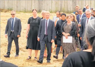  ?? PHOTOS / PETER DE GRAAF ?? New Prime Minister Chris Hipkins, flanked by ministers Willow-Jean Prime, Kiri Allan, Megan Woods and Kelvin Davis, is welcomed onto the Hall Rd site by local hapū Ngāti Rēhia.