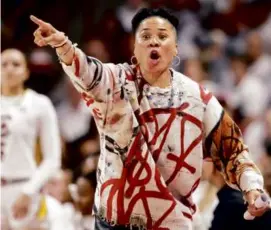  ?? NELL REDMOND/ASSOCIATED PRESS ?? Dawn Staley leads unbeaten and defending champion South Carolina into NCAA tourney play as the No. 1 overall seed.