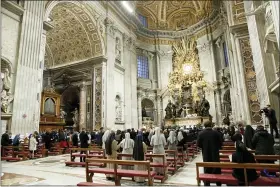  ?? REMO CASILLI — POOL PHOTO VIA AP ?? St. Peter’s Basilica is nearly empty as Pope Francis celebrates the Easter Vigil as coronaviru­s pandemic restrictio­ns stay in place for a second year running April 3at the Vatican.