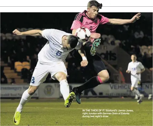 ??  ?? IN THE THICK OF IT: Scotland’s James Jones, right, tussles with German Slein of Estonia during last night’s draw