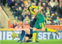  ?? LINDSEY PARNABY AFP VIA GETTY IMAGES ?? Norwich City striker Teemu Pukki slots the ball into the net against Tottenham, only to see the the goal rule out by VAR.