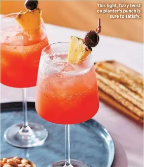  ?? ?? This light, fizzy twist on planter’s punch is
sure to satisfy.