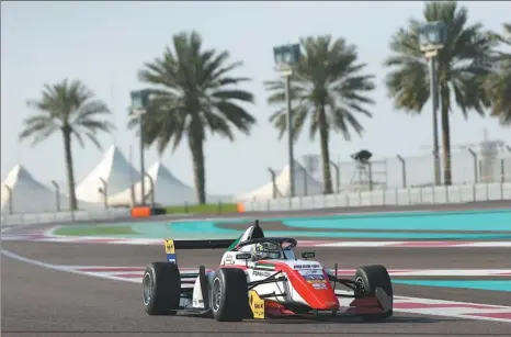  ?? PROVIDED TO CHINA DAILY ?? Zhou Guanyu takes a corner during a round of the Asian F3 Championsh­ip at Abu Dhabi’s Yas Marina Circuit on Saturday. After claiming the title over the weekend, the 21-year-old now switches his focus to the forthcomin­g F2 season.