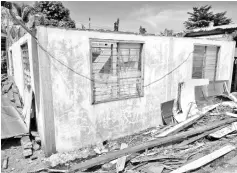  ??  ?? The damaged house.