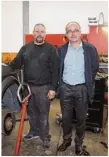  ??  ?? Guillaume Etienne, garagiste à Lisieux, et Thierry Lurienne, directeur régional de l’Adie.
