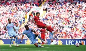  ?? ?? Roberto Firmino scores Liverpool’s equaliser. Photograph: Peter Byrne/PA