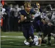  ?? TIM PHILLIS — FOR THE NEWS-HERALD ?? Kirtland’s Anthony DeMarco looks for running room as Otsego’s Ryan Gray pursues Nov. 14 during the Hornets’ 39-13 win in a Division V state semifinal at Byers Field.