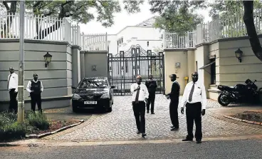  ?? /Alon Skuy/The Times ?? Summoned: The entrance to the Guptas’ house in Saxonwold. Among the people said to have visited the Gupta home are Finance Minister Malusi Gigaba, Water Affairs Minister Nomvula Mokonyane and Co-operative Governance Minister Des van Rooyen.