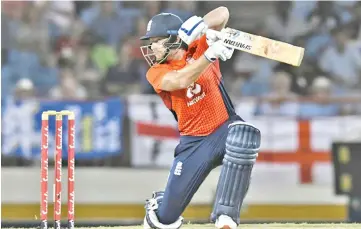  ??  ?? Jonny Bairstow helped guide England to victory in the first T20 against West Indies. - AFP photo
