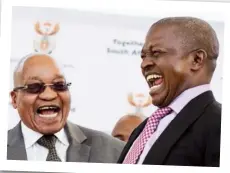  ??  ?? Former President Jacob Zuma and Mabuza sharing a joke at an event.