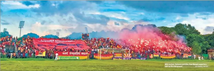  ??  ?? ■ With torches, festoons and tifos, East Bengal supporters light up the club ground. EAST BENGAL/TWITTER