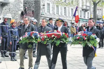  ??  ?? La cérémonie était présidée par Isabelle Sima, préfet du Cantal.