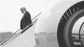  ?? AP ?? President Donald Trump steps off Air Force One as he arrives at Joint Base Andrews on Wednesday.