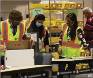  ??  ?? Election workers count ballots in Philadelph­ia, Pennsylvan­ia