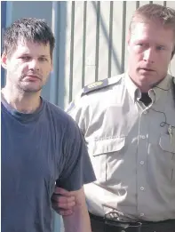  ?? BILL GRAVELAND/CP FILES ?? Convicted child abductor Randall Hopley, left, is led out of court in 2011.