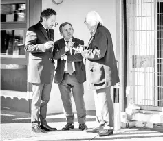  ??  ?? (From L) Paris Saint-Germain president and beIN Media chief Nasser al-Khelaifi’s Swiss laywer Gregoire Mangeat, French laywer Francis Szpiner and Swiss laywer Marc Bonnant wait outiside of the office of Swiss attorney general offices during the hearing...