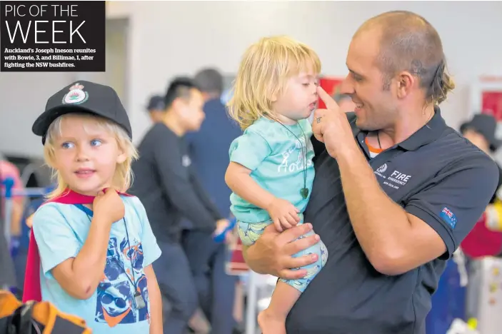  ??  ?? Auckland’s Joseph Ineson reunites with Bowie, 3, and Billimae, 1, after fighting the NSW bushfires.