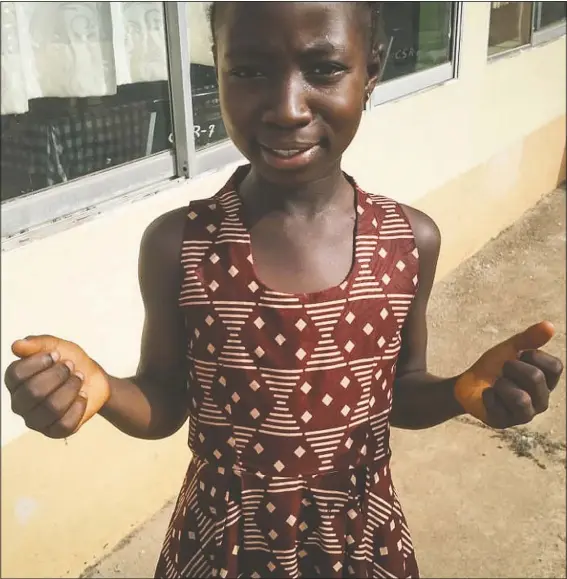  ?? (AP/Jonathan Paye-Layleh) ?? Joselia Kollie, who is the daughter of a popular gospel singer, explains Feb. 20 how she desires to spread developmen­tal messages through music with a song reminding Liberians of how much the country already has been through in Gbarnga, Liberia. Liberian radio stations are getting the word out about how to prevent coronaviru­s, and one tune here is especially gaining praise: The person singing it is 9-year-old Joselia.