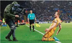  ?? AFP ?? LEICESTER: Tottenham Hotspur’s English striker Harry Kane (R) celebrates scoring his third goal, their fifth, during the English Premier League football match between Leicester City and Tottenham Hotspur at King Power Stadium.—