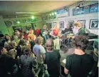  ?? PHOTO: FRASER THOMPSON / DUNEDINSOU­ND.COM ?? Music fans listen to Wellington band Wiri Donna at the Crown Hotel. The hotel is one of the last live music venues in Dunedin.