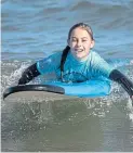  ?? Pictures: PA. ?? Lily Owen learning to surf in Yorkshire.