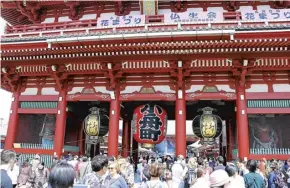  ??  ?? Crowds outside Senso-ji, Tokyo’s oldest temple