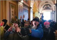  ??  ?? The angry mob pours into the Capitol.