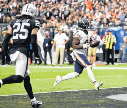  ?? CHRIS UNGER/GETTY ?? Damien Williams rushes for a touchdown during the first half against the Las Vegas Raiders on Sunday.