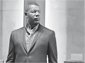  ?? BEN MARK HOLZBERG, SYFY ?? Dennis Haysbert plays corporate enforcer Julian in the Syfy dystopian drama Incorporat­ed.