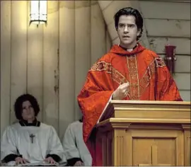  ?? Eike Schroter Netf lix ?? LINKLATER, right, delivers a stirring sermon as Father Paul in Netf lix’s new miniseries “Midnight Mass,” from “Hill House” creator Mike Flanagan.