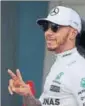  ?? REUTERS ?? Lewis Hamilton reacts after setting pole position on Saturday.