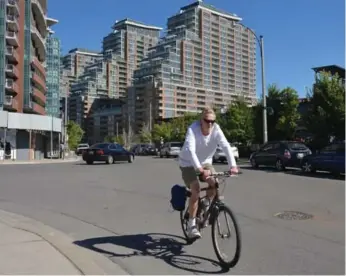  ?? CARLOS OSORIO/TORONTO STAR ?? Those choosing city life, residing in neighbourh­oods such as Toronto’s Liberty Village, shown here, over suburbia are fuelling the real estate market, according to a report by Pricewater­houseCoope­rs and the Urban Land Institute.