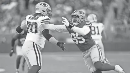  ?? THEARON W. HENDERSON / GETTY IMAGES ?? Green Bay Packers offensive lineman Royce Newman, shown here in the preseason opener, struggled in training camp Monday.