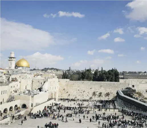  ?? GALI TIBBON / AFP / Gett y Imag es ?? The Western Wall and the Dome of Rock in Jerusalem.