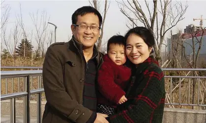  ?? Photograph: Wang Quanxiu/AP ?? The human rights lawyer Wang Quanzhang (left) and his wife Li Wenzu with their son in 2015. TheCHRD report included testimony that in March police had searched the new school of Wang’s son.