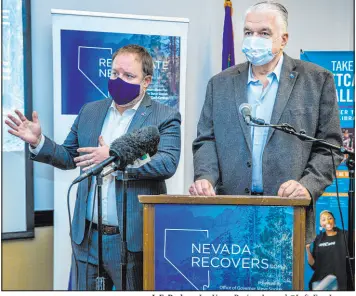  ?? L.E. Baskow Las Vegas Review-journal @Left_eye_images ?? Treasurer Zach Conine, left, and Governor Steve Sisolak conclude the Nevada Recovers Listening Tour at the West Las Vegas Public Library on Tuesday.