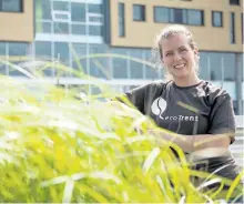  ?? JASON BAIN/EXAMINER ?? Trent University sustainabi­lity co-ordinator Shelley Strain is seen near a green roof beside Gzowski College on Tuesday. The green rooves on campus will be included in Frosh Week tours to show arriving students what the university does when it comes to...