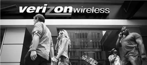  ?? JOHN MINCHILLO / The ASSOCIATED PRESS ?? Sources say Verizon, which is eyeing an entrance to Canada’s mobile telecom market, is in talks with Wind Mobile.
