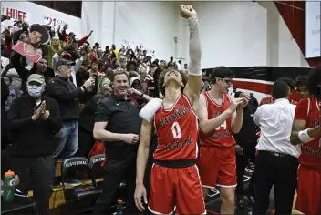  ?? PHOTO BY ALEX GALLARDO ?? Harvard-westlake guard Trent Perry celebrates after his team defeated Centennial in the Open Division regional final.