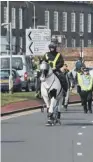  ??  ?? The police escort for the PTUC m