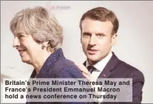  ??  ?? Britain’s Prime Minister Theresa May and France’s President Emmanuel Macron hold a news conference on Thursday